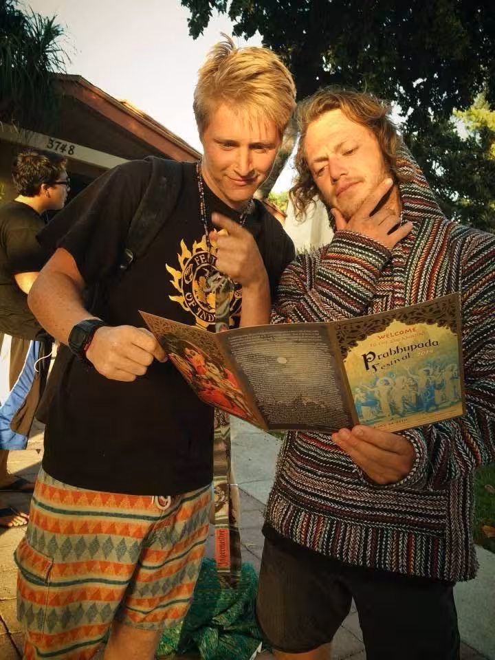 Visitors reading festival brochure